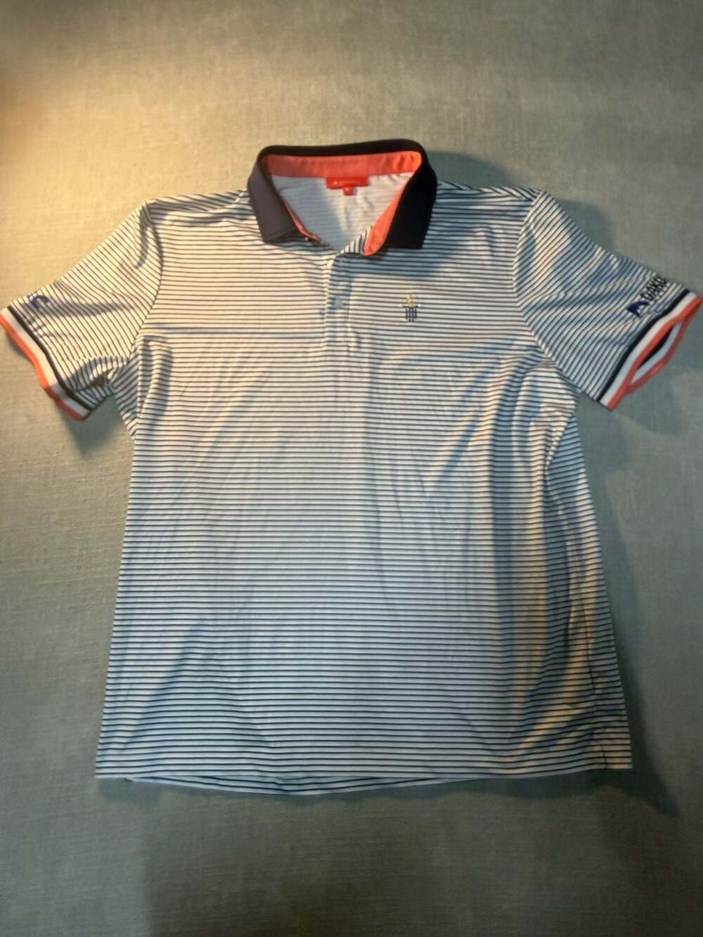 Redvanly Performance Stripe Polo Shirt with Aflac and Dakota Matting Branding